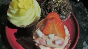 3 cupcakes in a variety of colours to be baked and eaten at your hen party 